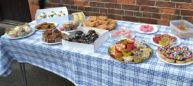 table of cakes for a cake sale