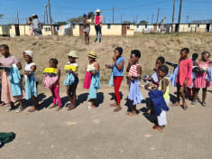 Girls lining up for school uniform
