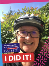 woman in cycle helmet with slogan