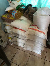 Bags of rice, beans and containers of cooking oil